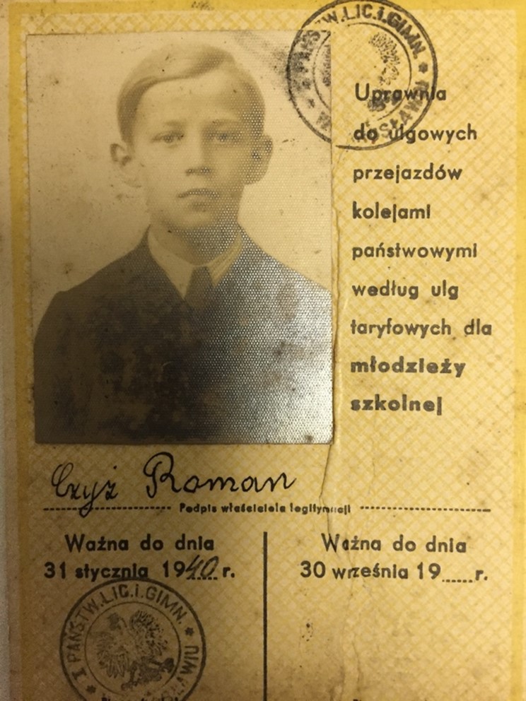 Polish identification card, yellowed and aged, with photo of a young boy